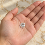 Diamond gemstone held in hand