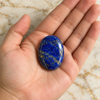 Lapis Lazuli gemstone held in hand