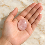 Rose Quartz gemstone held in hand