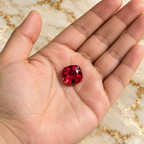 Spinel gemstone held in hand